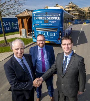 Partners shaking hands next to Beaulieu bus service